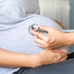 doctor-checking-pregnant-woman-with-stethoscope